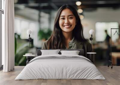 Portrait of happy asian woman smiling standing in modern office space Wall mural