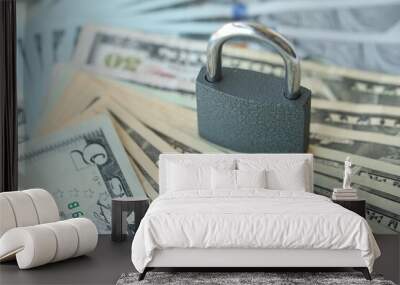 USD Dollar bills and a closed lock as a concept for imposing economic sanctions. Wall mural