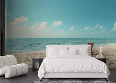 sandy ocean beach with a sun lounger Wall mural