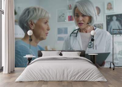 The doctor and elderly patient Wall mural