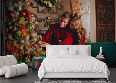 Couple celebrates new year/Christmas Wall mural