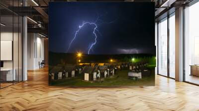 Lightning during a stormy night Wall mural