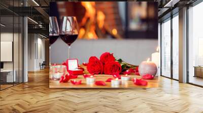 Date in restaurant decorated table with roses and proposal ring no people Wall mural