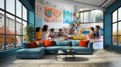 Group of diverse preschool children sitting in a circle in a bright classroom with colorful decor Wall mural