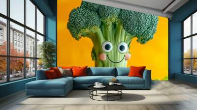 broccoli with cartoon eyes on yellow background Wall mural