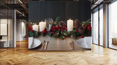 The dining table is elegantly arranged with white plates, silver utensils, and adorned with pinecones and candles, creating a warm, inviting atmosphere for the holidays Wall mural