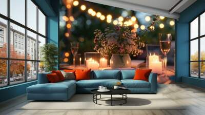 Romantic Outdoor Dinner Table Setting with Candles and Festive Lights,  intimate dinner setting outdoors with candles and string lights at dusk on terrace Wall mural