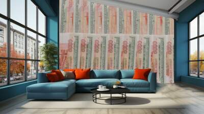 A large number of American hundred dollar bills and Russian five thousand dollar bills Wall mural