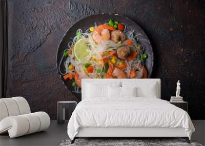 A traditional dish of Asian cuisine. Japanese noodles with shrimps, shiitake mushrooms and vegetables Wall mural