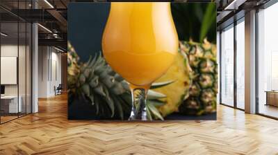 Fresh pineapple juice in the glass Wall mural