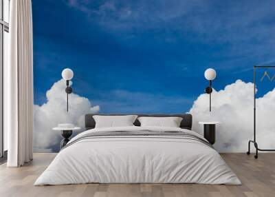 Blue sky background with big fluffy clouds Wall mural