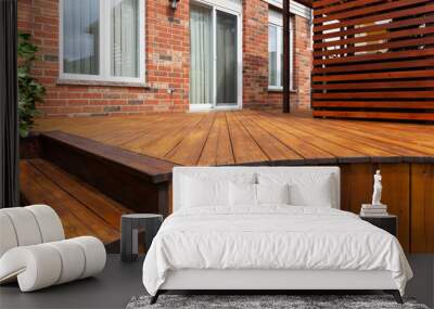 Backyard wooden deck floor boards with fresh brown stain Wall mural