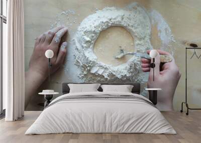 Top view of raw dough, baking ingredients on wooden surface. A woman stirs flour with water. Step-by-step recipe for homemade pastries, dumplings and dumplings. copy space, soft focus Wall mural