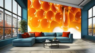 Close-up of golden honeycomb with dripping honey on white background, sweet, close-up Wall mural