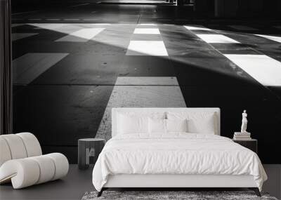 A black and white photo of a crosswalk with a white line Wall mural