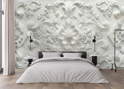 An intricate white relief design featuring floral motifs and ornate patterns. The texture is smooth, showcasing detailed craftsmanship in a classic style Wall mural