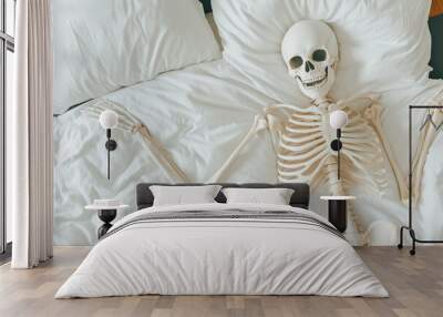 skeleton laying in bed with white sheets, funny realistic Halloween concept Wall mural