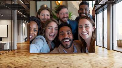 A dynamic selfie unites a smiling multiethnic group of professionals, from clerks to legal experts, showcasing a blend of cultures and backgrounds in a single frame of camaraderie.  Wall mural