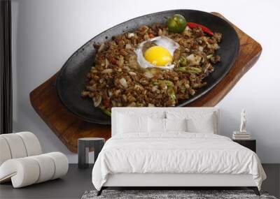 Pork sisig, a Filipino dish, served on a sizzling plate Wall mural