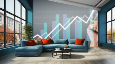 Hand touching a graphs of financial indicator accounting market economy analysis chart Wall mural