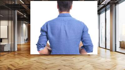 back veiw of a seated young brunette man Wall mural