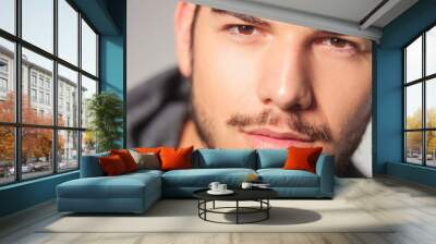 closeup of a young man's face Wall mural