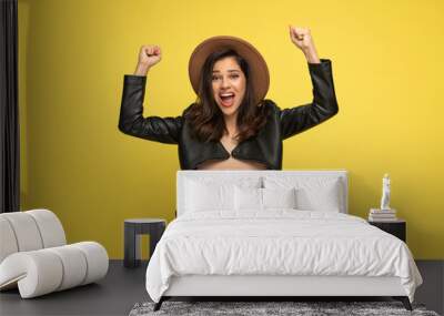 happy young woman screaming and celebrating victory Wall mural