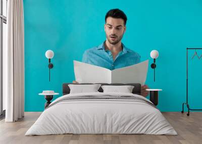 man reading the newspaper shocked Wall mural