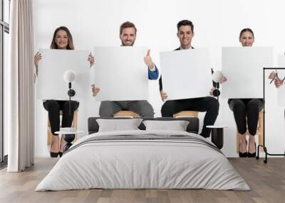 Team of 6 businessmen holding blank billboard Wall mural