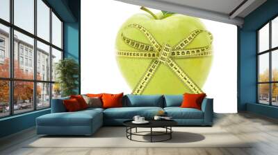 Diet concept. Apple with measuring tape Wall mural