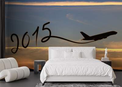 New year 2015 drawing by airplane on the air at sunset Wall mural