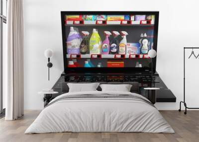 Online shopping concept with laptop and cleaning products Wall mural