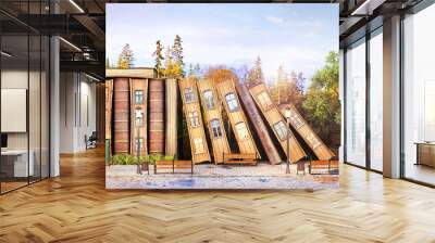 Library concept. Fantasy literature. Stack of old books as street of the city. 3d illustration Wall mural