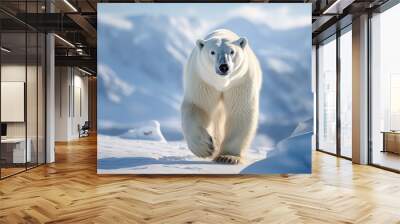 Polar bears walks in extreme winter weather, standing above snow with a view of the frost mountains Wall mural