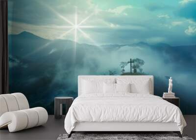 View of the Cross on the hill at sunlight, with a beautiful blue sea of ​​clouds Wall mural