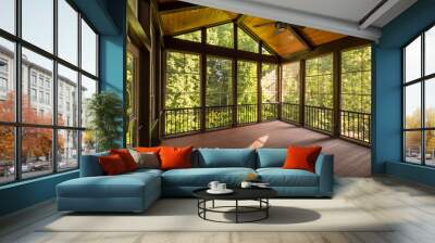 Modern new screened porch with plastic windows and composite floor with summer woods in the background. Wall mural