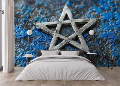 3d silver star pentagram against blue textured background Wall mural