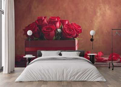 beautiful red roses inside gift box on wooden surface with scattered petals for valentines day celebration Wall mural