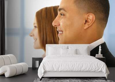 business man and business woman smiling Wall mural