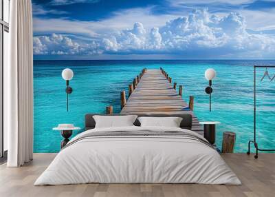 Wooden jetty in tropical lagoon with turquoise water Wall mural