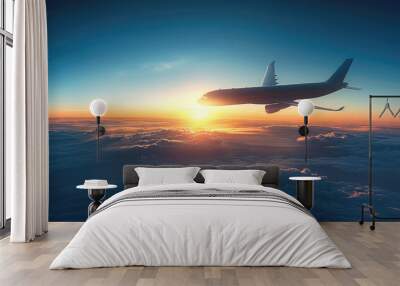 A plane is flying in the blue sky. The background is the moment of sunrise, a gradient of blue from golden yellow. Wall mural