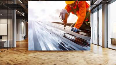 Construction worker install new roof,Roofing tools,Electric drill used on new roofs with Metal Sheet. Wall mural