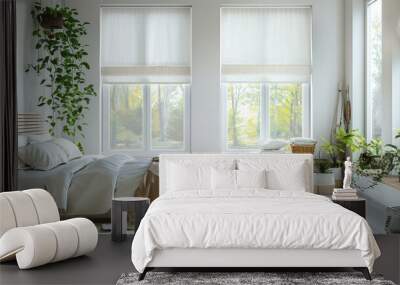 Minimalist bedroom with white walls, windows covered in the style of light grey roller blinds and wooden window frames, white bed with beige pillows and blanket, green plants. Generative AI. Wall mural