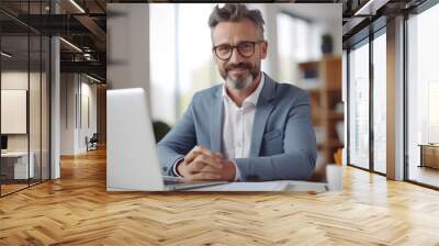 Portrait of business mature man at office desk with smile, Online report or social media, Internet. Wall mural