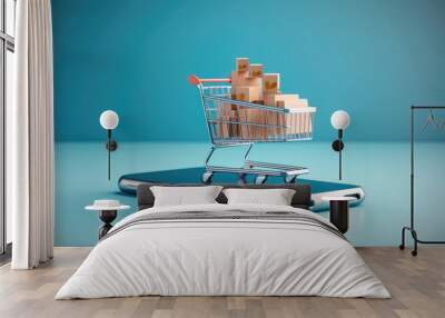 Shopping cart rising out of phone screen on blue background, Concept of e-commerce, marketplace, web stores. Wall mural