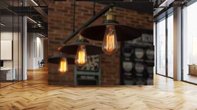 Vintage interior lighting lamp in coffee shop. Wall mural