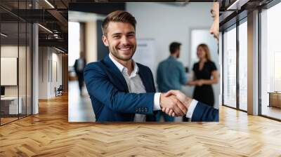 Portrait of cheerful young executive manager handshake with new partner employee after interview meeting. Collaboration teamwork hiring concept Wall mural