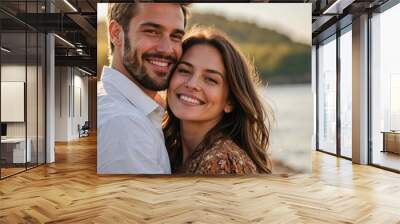 Romantic casual attire couple smiling and cuddling hugging on a sunny day background. Happy relationship love concept Wall mural