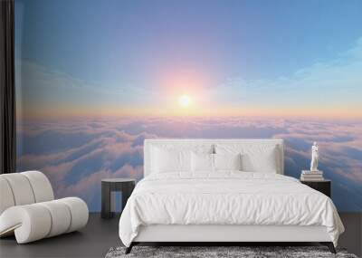 A panoramic view of the sunset over a sea of fluffy clouds. The sun is in the center of the image and casts a warm glow over the clouds. Wall mural