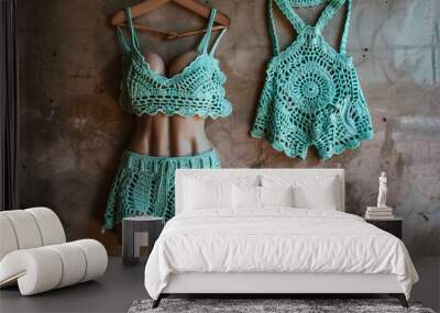 A crocheted top and shorts set on a mannequin. Wall mural